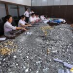 云南女子赢官司获赔10万枚硬币 银行18人都快忙死